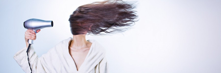 woman drying hair